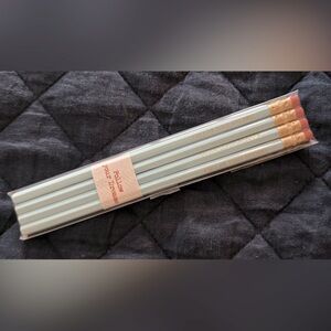 Follow Your Dreams. Set of light blue pencils with gold lettering.